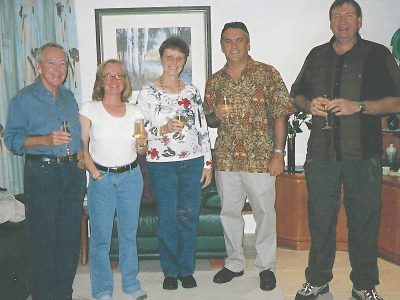 Photo of David Hopley and Great Barrier Reef Book Team standing and holding a drink