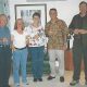 Photo of David Hopley and Great Barrier Reef Book Team standing and holding a drink